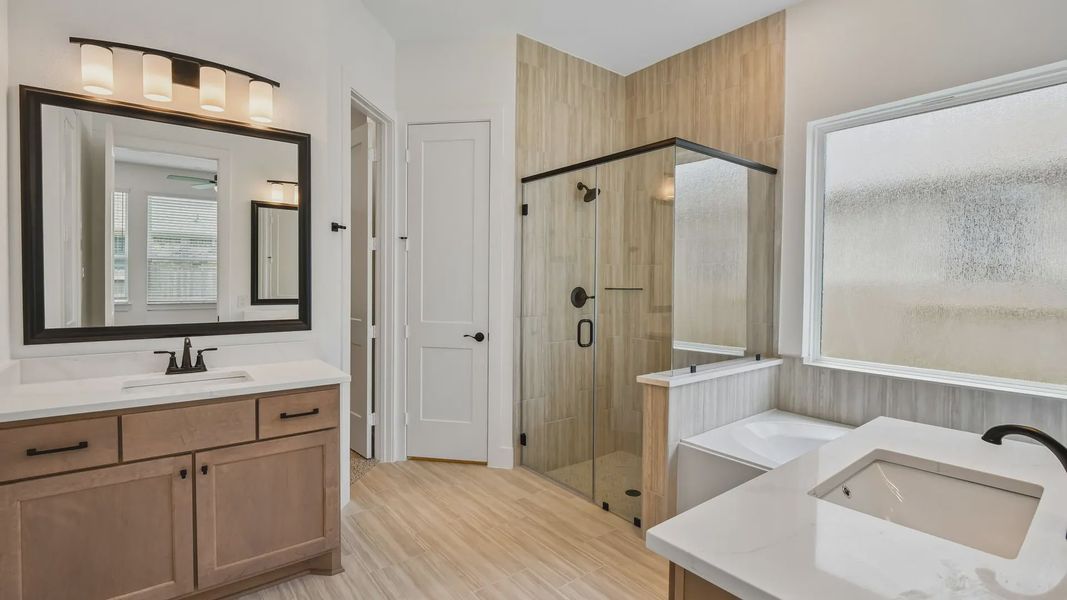 Furnished interior view inside a new home in Artavia, Conroe (Image 12).
