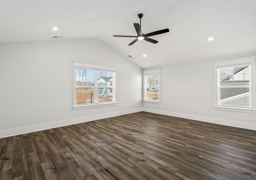 The large master bedroom with tons of natural light.
