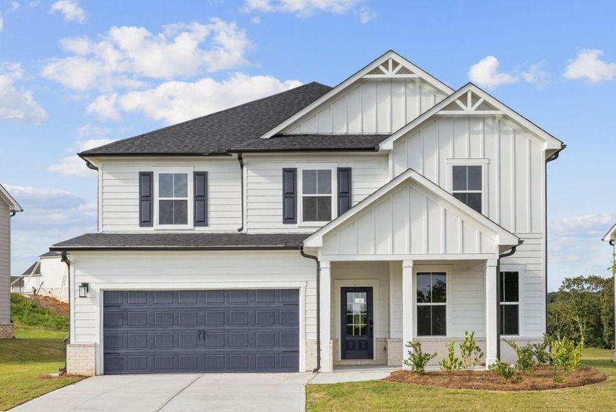 Front exterior of a new home in The Estates at Gainesville Township, Gainesville, GA, highlighting curb appeal (Image 1). Front exterior of a new home in The Estates at Gainesville Township, Gainesville, GA, highlighting curb appeal (Image 1).