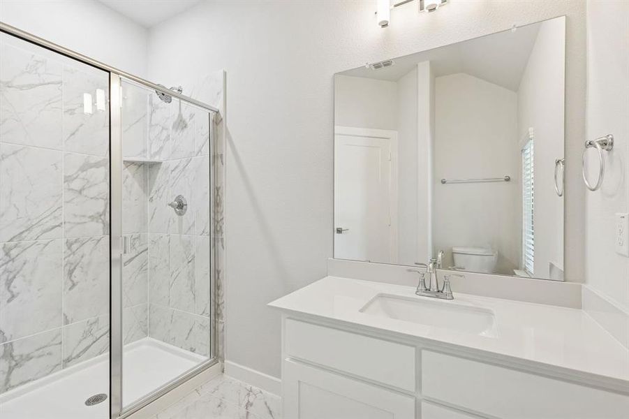 Bathroom in the Masters home plan by Trophy Signature Homes – REPRESENTATIVE PHOTO Bathroom in the Masters home plan by Trophy Signature Homes – REPRESENTATIVE PHOTO