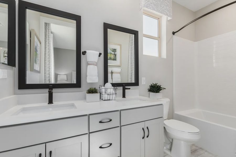 Representative furnished interior of a home built from the 2326 by Elliott Homes in Acacia at Santana, Yuma (Image 38).