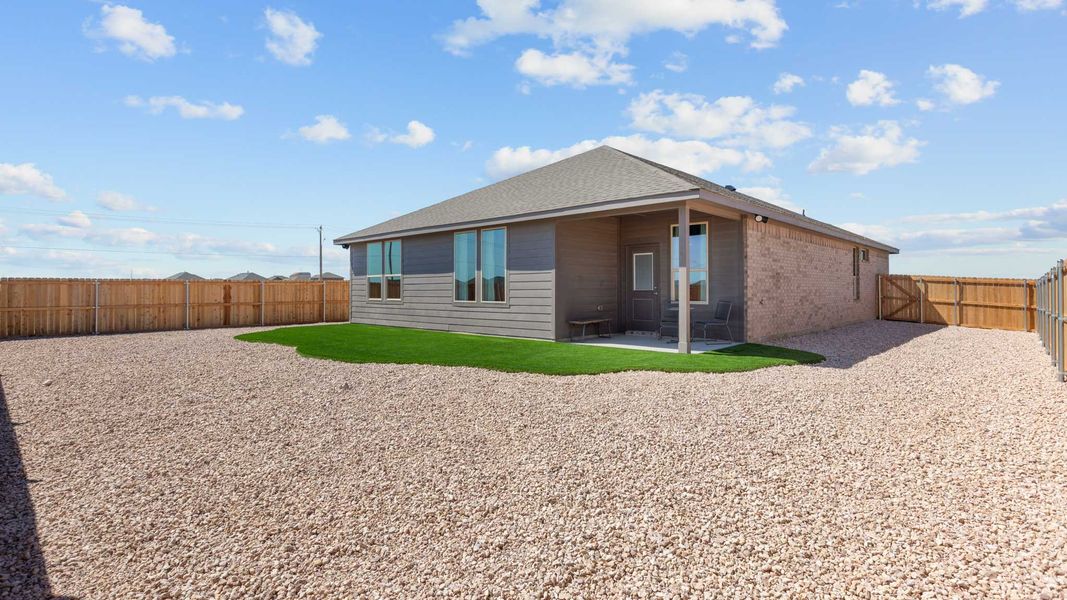 Exterior details and patio area of a home in Mustang Ridge, Andrews (Image 3).