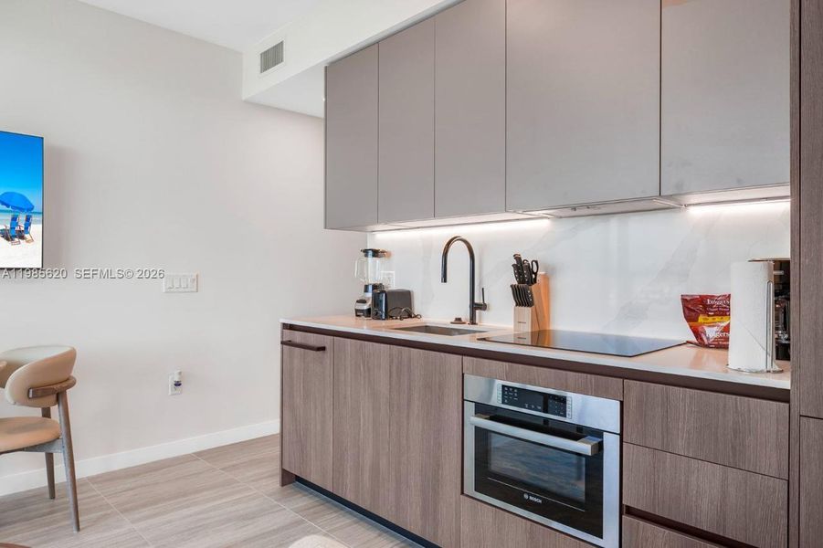 Furnished interior view inside a new home in , Miami Beach (Image 8). Furnished interior view inside a new home in , Miami Beach (Image 8).