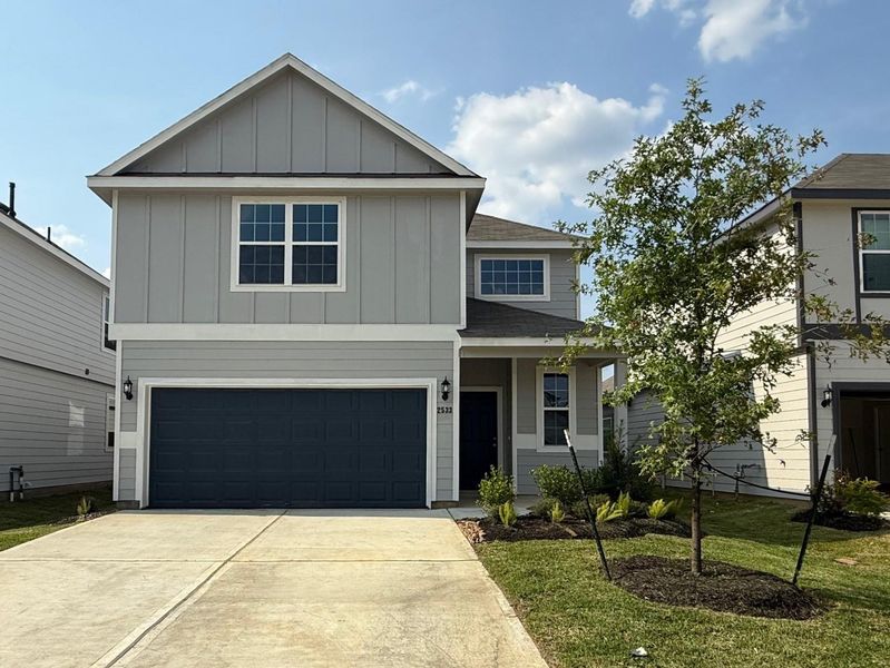 Front exterior of a new home in Cliffstone Hills, Conroe, TX, highlighting curb appeal (Image 1). Front exterior of a new home in Cliffstone Hills, Conroe, TX, highlighting curb appeal (Image 1).