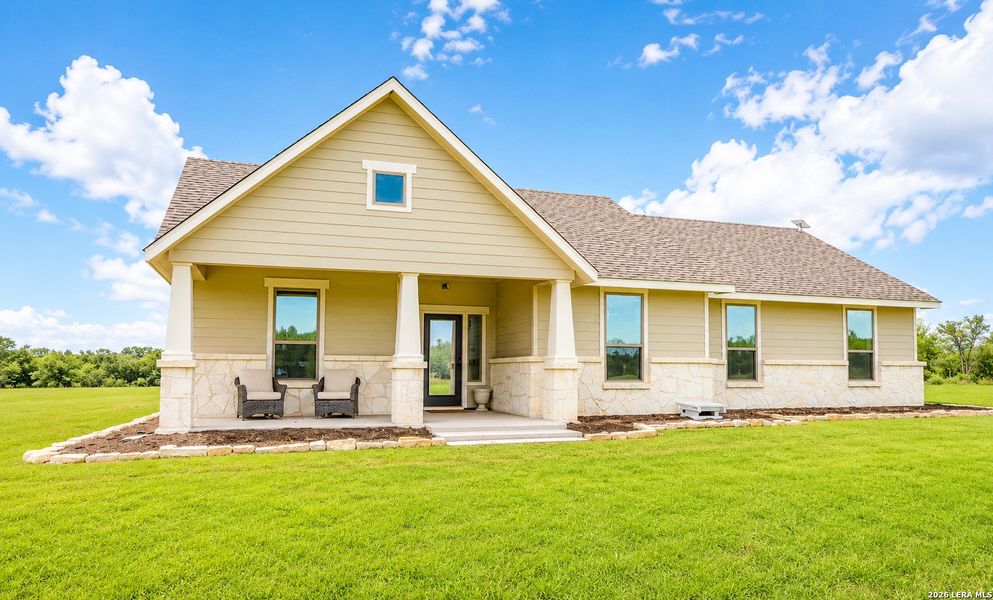 Exterior details and patio area of a home in , Devine (Image 17).