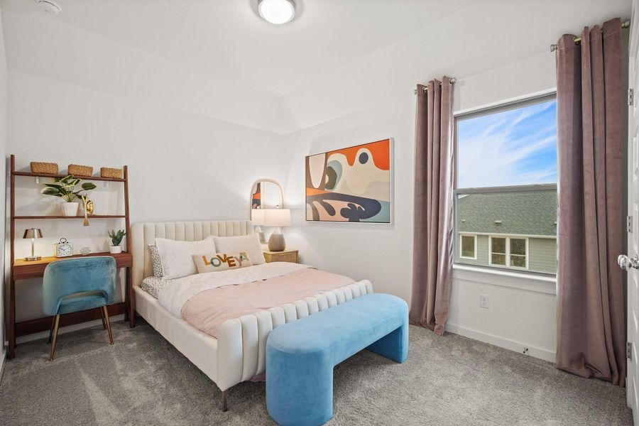 Bedroom in the Oak home plan by Trophy Signature Homes – REPRESENTATIVE PHOTO