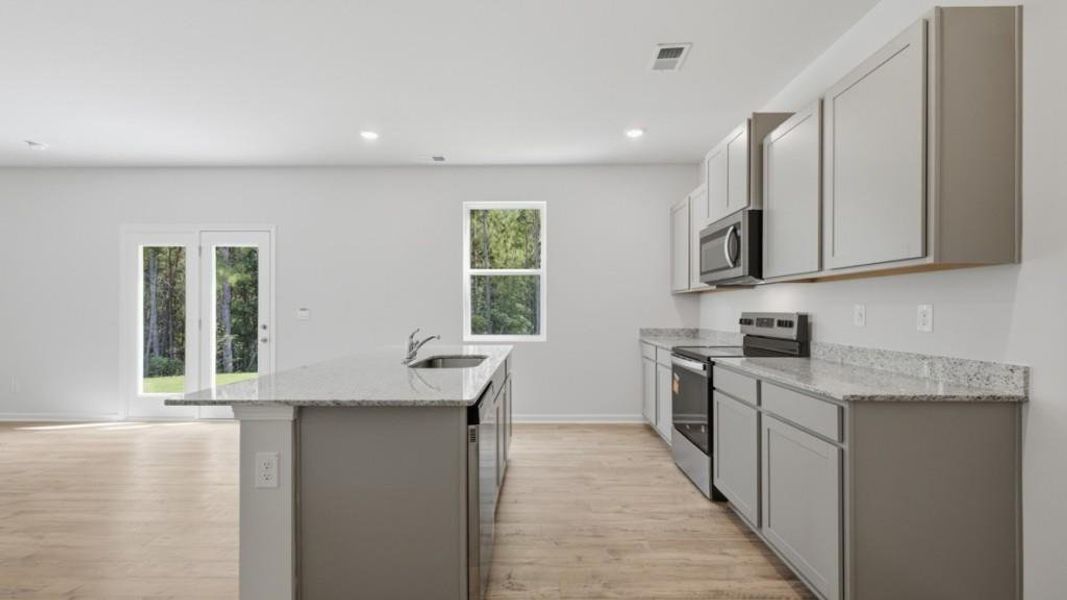 Furnished interior view inside a new home in Oaks at Cedar Grove, Fairburn (Image 8).