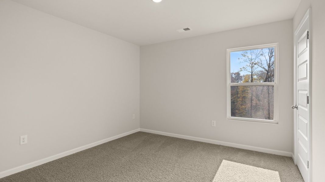 Spacious, unfurnished interior of a new home in The Reserve at Calcutta, Stockbridge (Image 24).