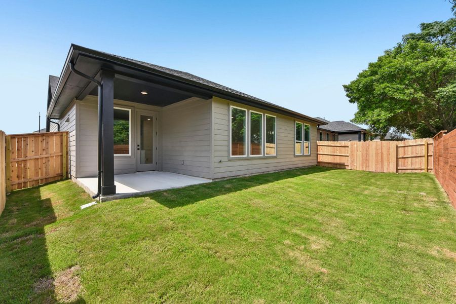 Exterior details and patio area of a home in Parkton Square, Kyle (Image 3).