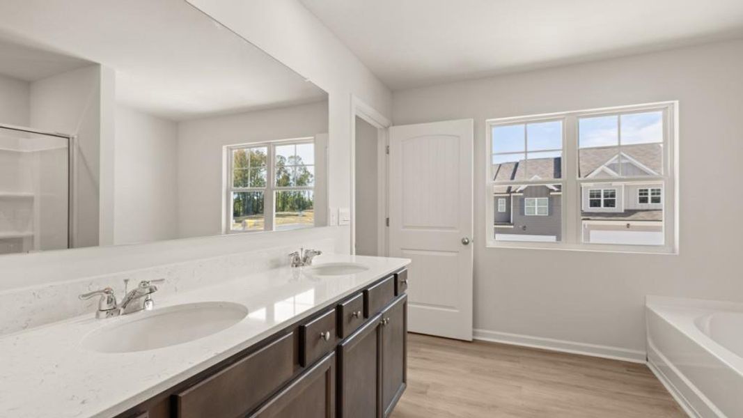 Furnished interior view inside a new home in Falcon Landing Townhomes, Gainesville (Image 3).
