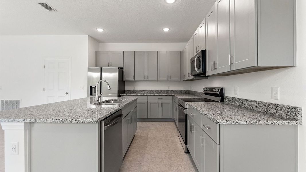 Representative furnished interior of a home built from the Aspire by Park Square Residential in Leela Reserve, Tavares (Image 6).