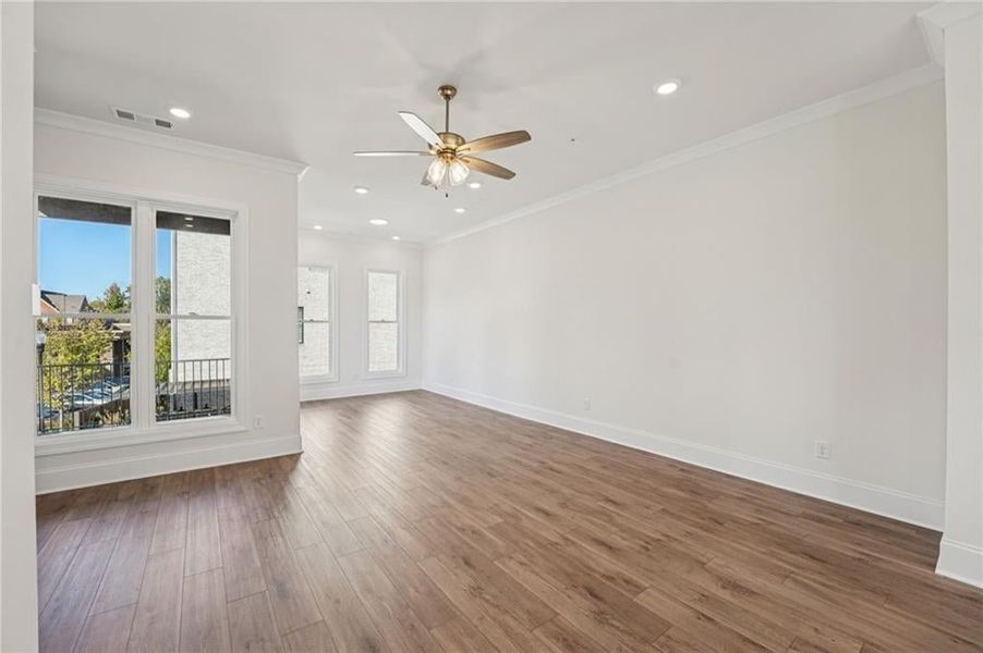 Sitting or Sun room add cozy space to your primary bedroom.  This space offers access to private deck in you  primary bedroom. Image is of a previously built Chamberlain.