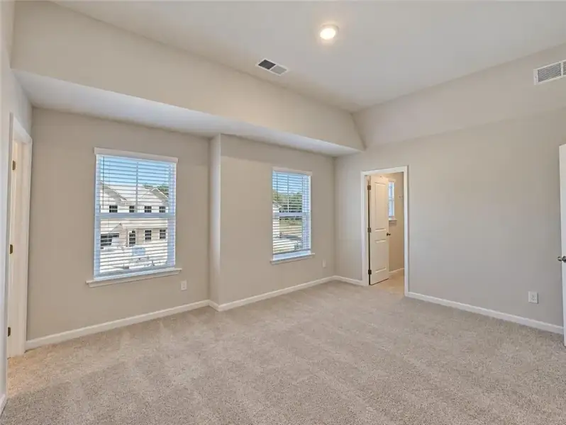 Spacious, unfurnished interior of a new home in Kingsmere Estates, Loganville (Image 29).