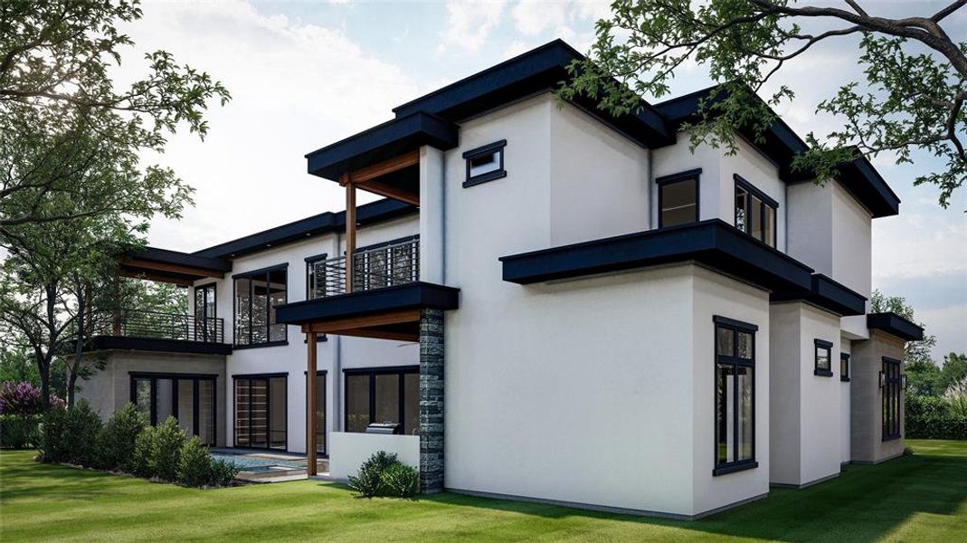 Rear view of property featuring a lawn and a balcony