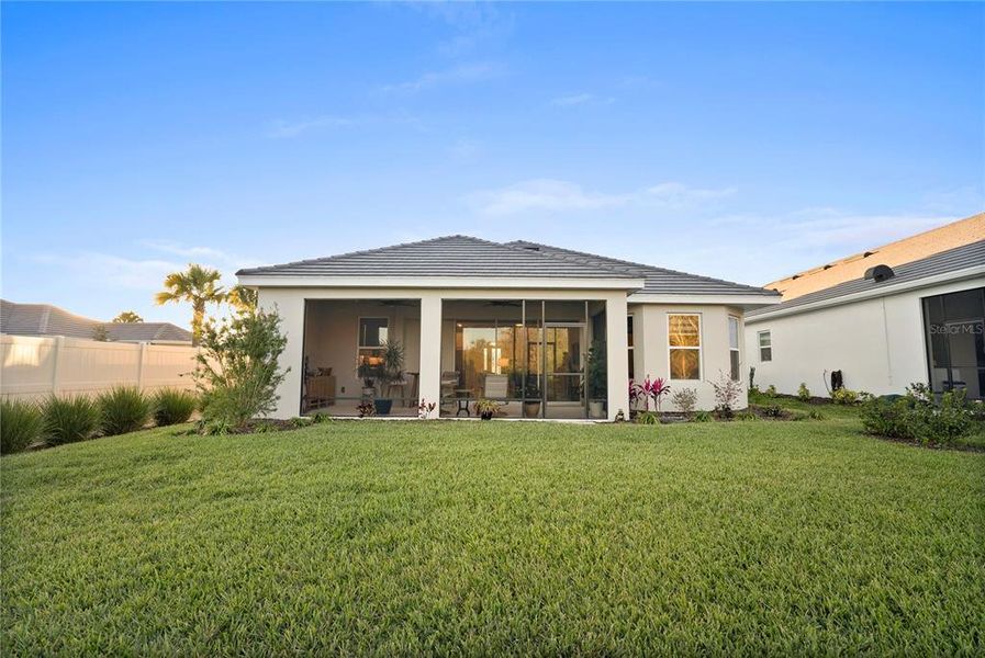 Exterior details and patio area of a home in Esplanade at Wiregrass Ranch, Wesley Chapel (Image 25).