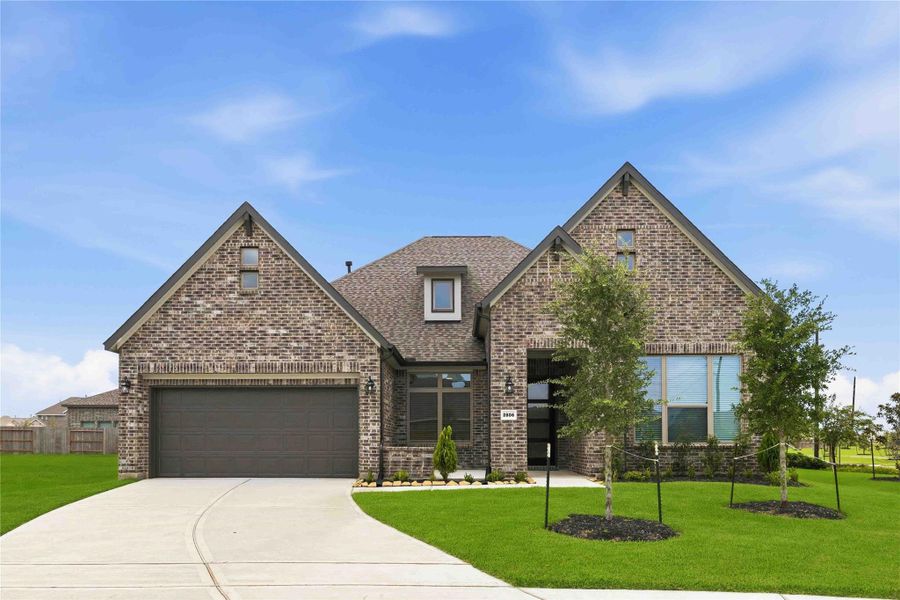 Front exterior of a new home in Canterra Creek 60', Rosharon, TX, highlighting curb appeal (Image 22). Front exterior of a new home in Canterra Creek 60', Rosharon, TX, highlighting curb appeal (Image 22).