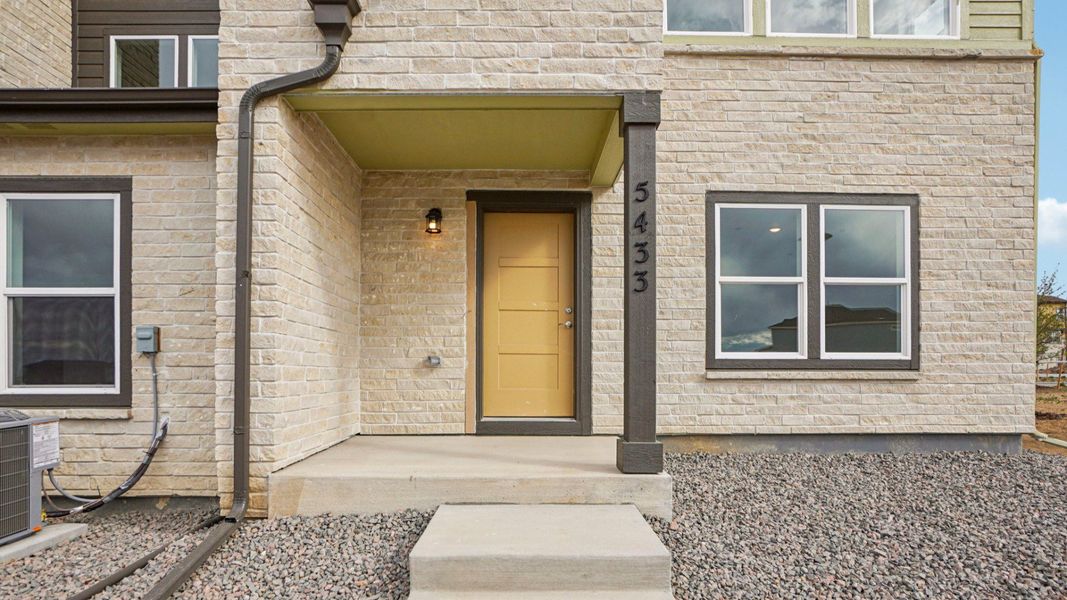 Exterior details and patio area of a home in Windler Townhomes, Aurora (Image 4). Exterior details and patio area of a home in Windler Townhomes, Aurora (Image 4).