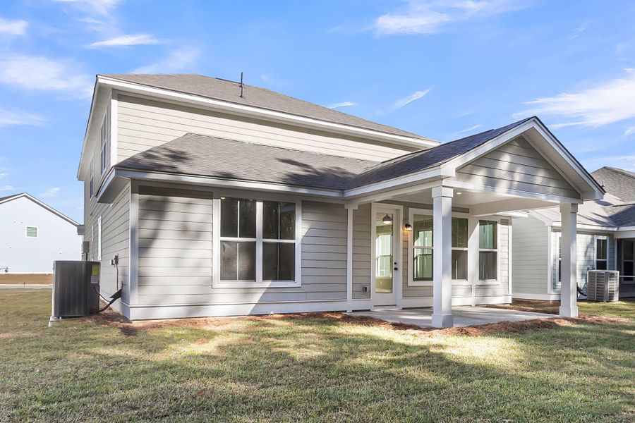 Exterior details and patio area of a home in High Point at Foxbank, Moncks Corner (Image 30). Exterior details and patio area of a home in High Point at Foxbank, Moncks Corner (Image 30).