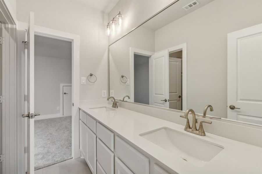 Bathroom with dual vanity