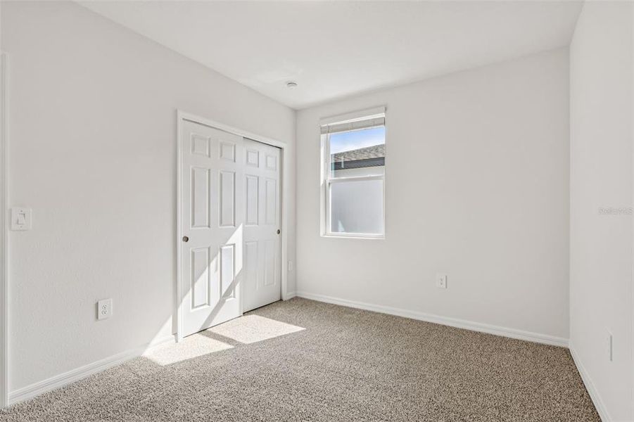 Spacious, unfurnished interior of a new home in Bradbury Creek - Signature Series, Haines City (Image 27).