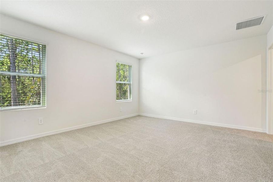 Spacious, unfurnished interior of a new home in Bradford Park, Ormond Beach (Image 25).