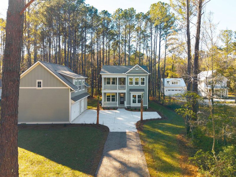 Front exterior of a new home in , Awendaw, SC, highlighting curb appeal (Image 31).
