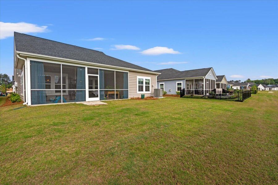 Exterior details and patio area of a home in Horizons at Summers Corner | 55+, Summerville (Image 33).