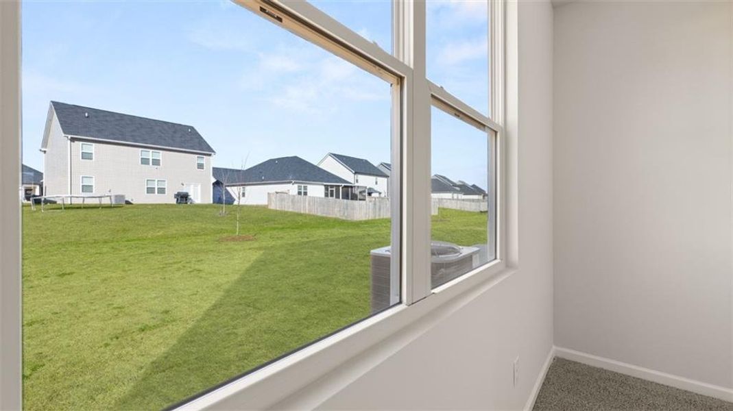 Exterior details and patio area of a home in The Preserve at Agricultural Village, Perry (Image 25).