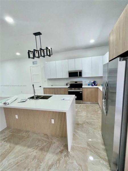 Furnished interior view inside a new home in , Clewiston (Image 7). Furnished interior view inside a new home in , Clewiston (Image 7).