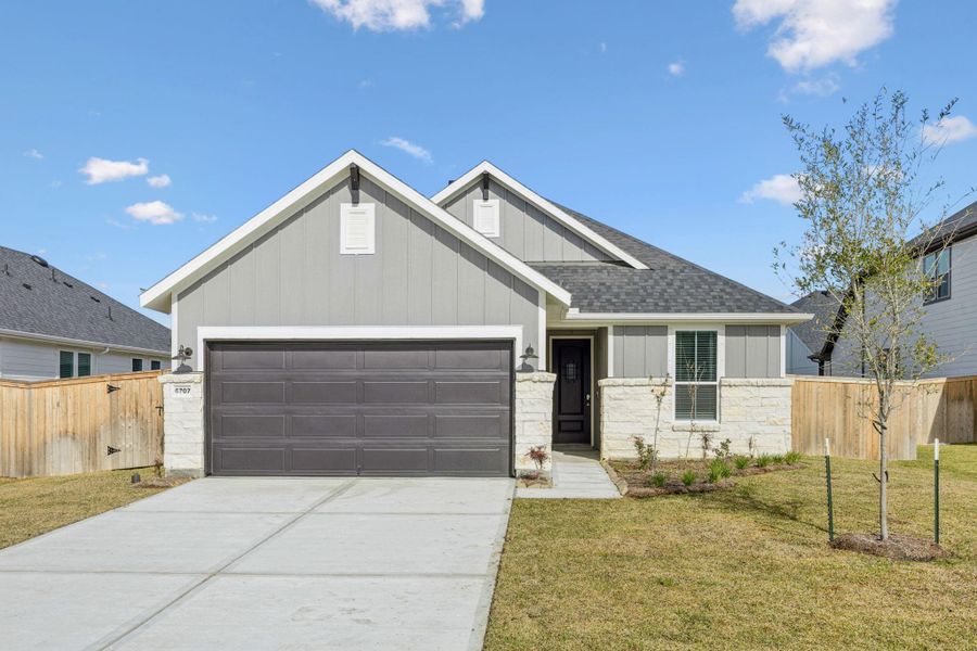 Front exterior of a new home in Windcress, Cove, TX, highlighting curb appeal (Image 2). Front exterior of a new home in Windcress, Cove, TX, highlighting curb appeal (Image 2).