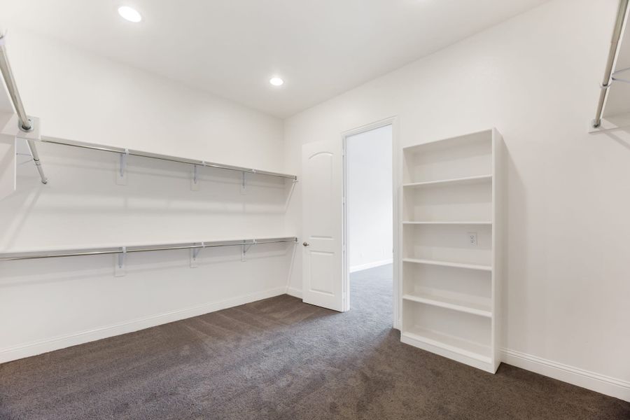Representative unfurnished interior of a home built from the Bridgeport by UnionMain Homes in Lake Breeze, Lavon (Image 15).