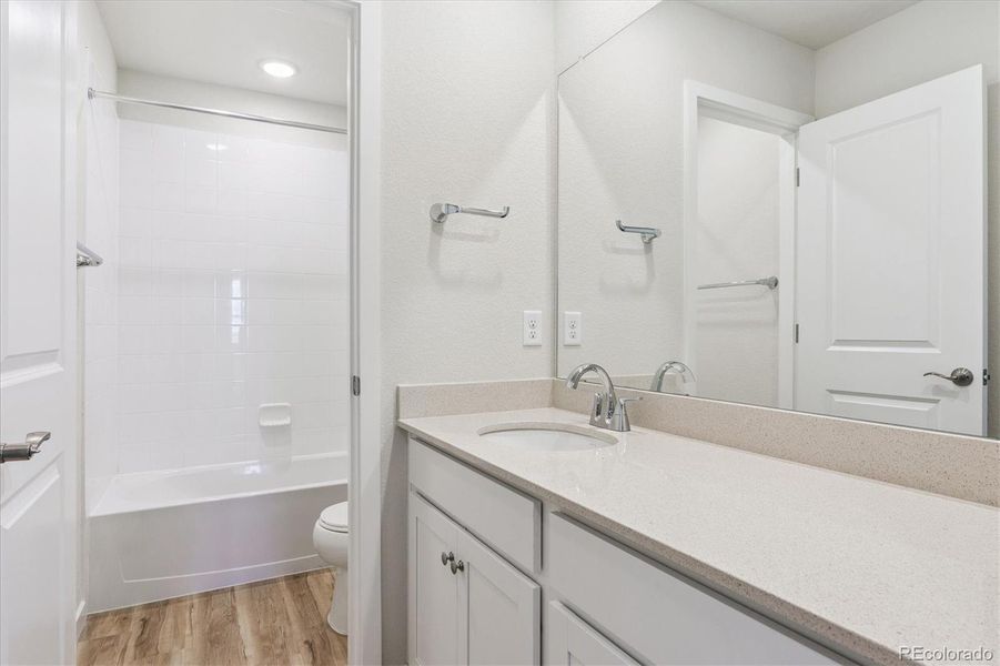 Furnished interior view inside a new home in Sweetgrass, Dacono (Image 4).