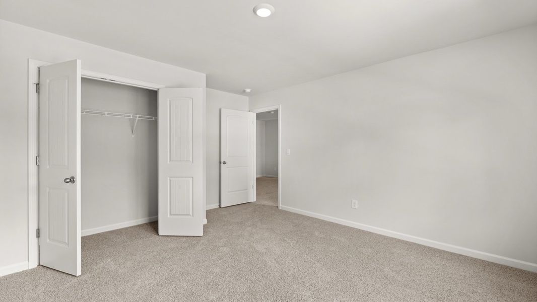 Spacious, unfurnished interior of a new home in Northwoods at Mirror Lake, Villa Rica (Image 26).