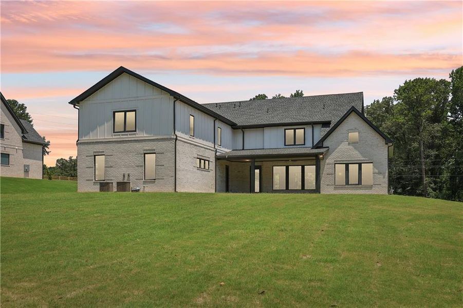 Front exterior of a new home in , Braselton, GA, highlighting curb appeal (Image 58).