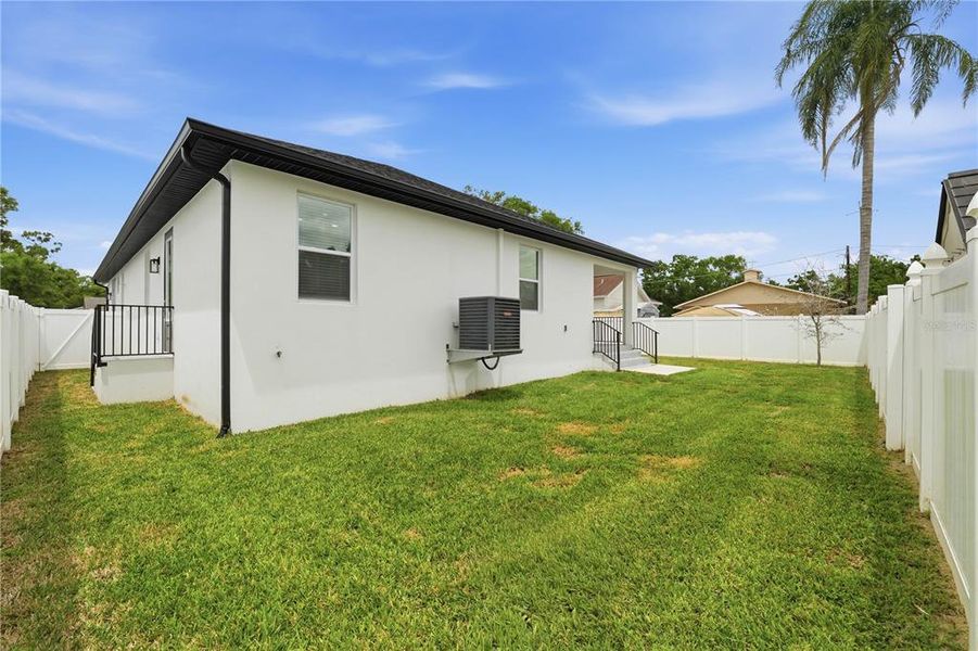 Exterior details and patio area of a home in , Tampa (Image 26).