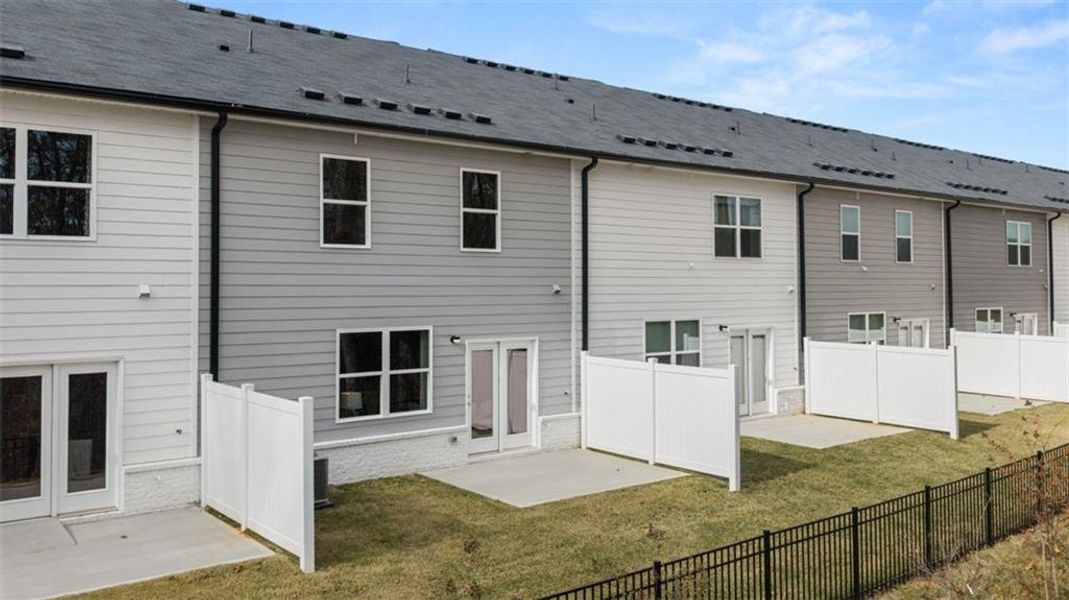 Exterior details and patio area of a home in Echo Glen, Stockbridge (Image 27).