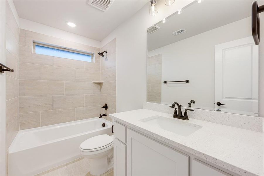 Furnished interior view inside a new home in Woodstone, Providence Village (Image 11). Furnished interior view inside a new home in Woodstone, Providence Village (Image 11).