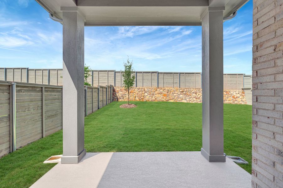 Exterior details and patio area of a home in Treeline, Justin (Image 4). Exterior details and patio area of a home in Treeline, Justin (Image 4).