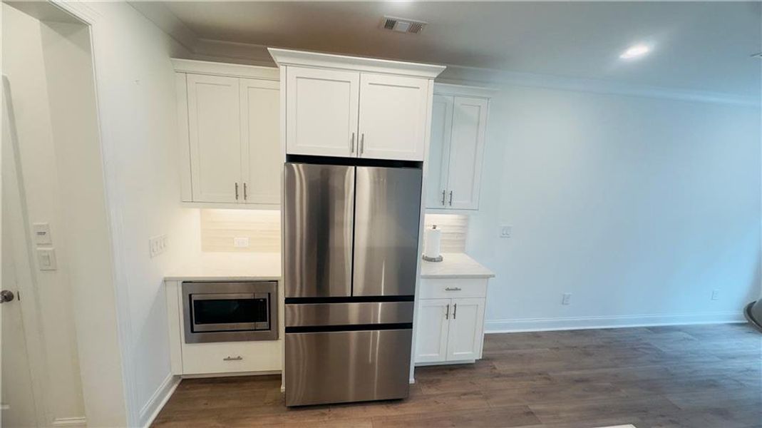 Furnished interior view inside a new home in , Cumming (Image 6). Furnished interior view inside a new home in , Cumming (Image 6).