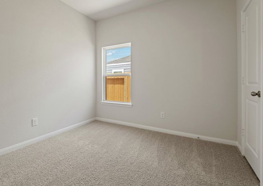 Secondary bedroom with lush carpet flooring Secondary bedroom with lush carpet flooring