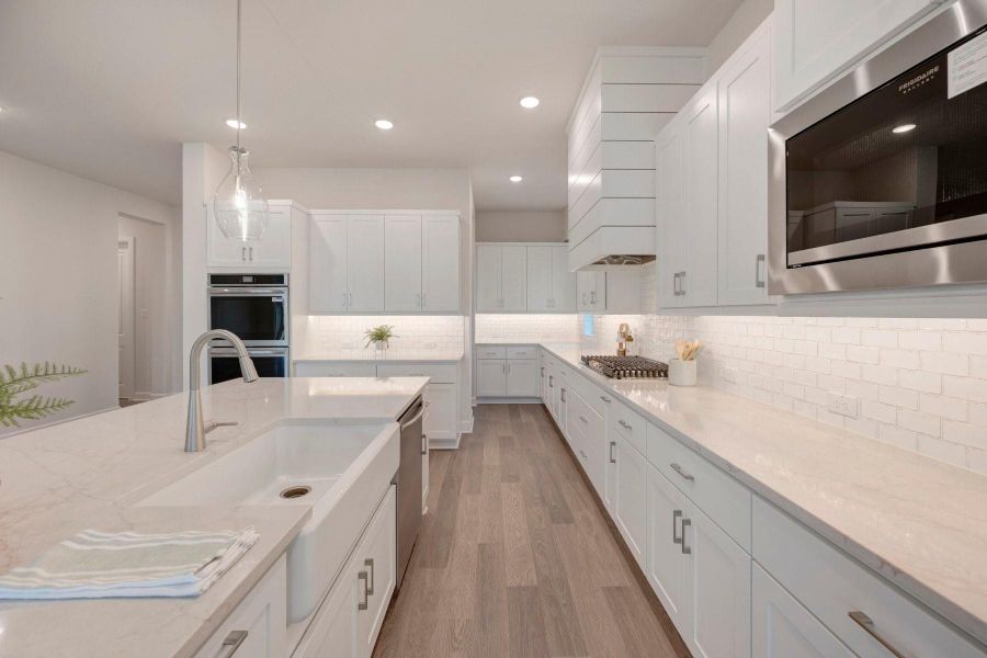Furnished interior view inside a new home in Jordan Ranch - Premier Collection, Fulshear (Image 6).