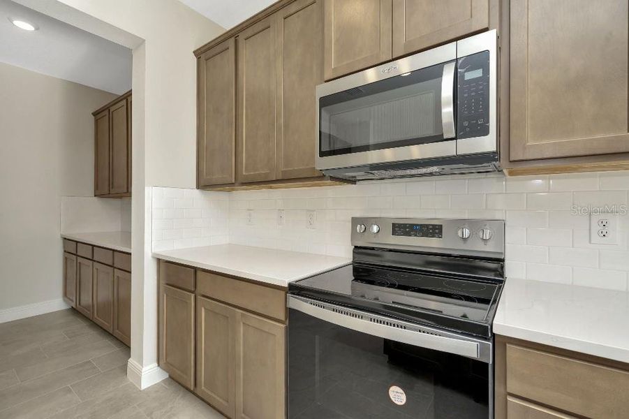 Furnished interior view inside a new home in Mangrove Manor, Apollo Beach (Image 7).