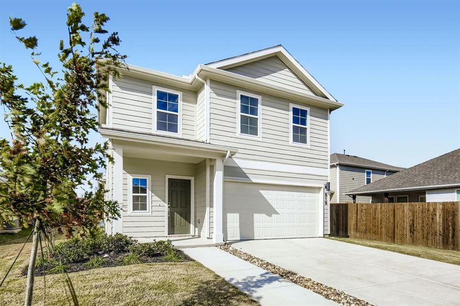Front exterior of a new home in Ambergrove, Royse City, TX, highlighting curb appeal (Image 2).