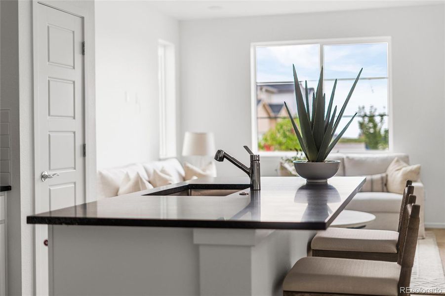 Furnished interior view inside a new home in Painted Prairie, Aurora (Image 9).