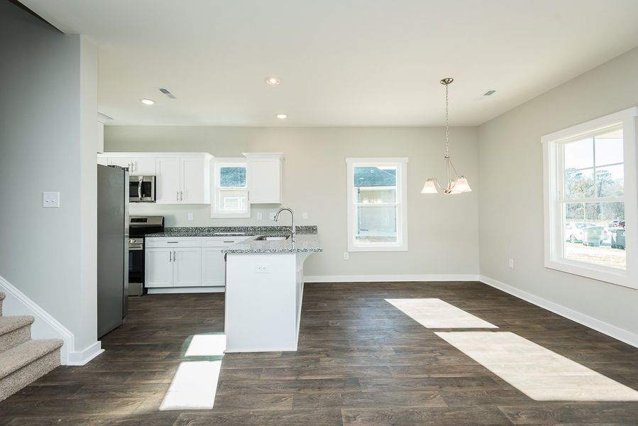 Representative furnished interior of a home built from the Thomas by Foundation Home Builders LLC in Pinnix Loop, Burlington (Image 4).