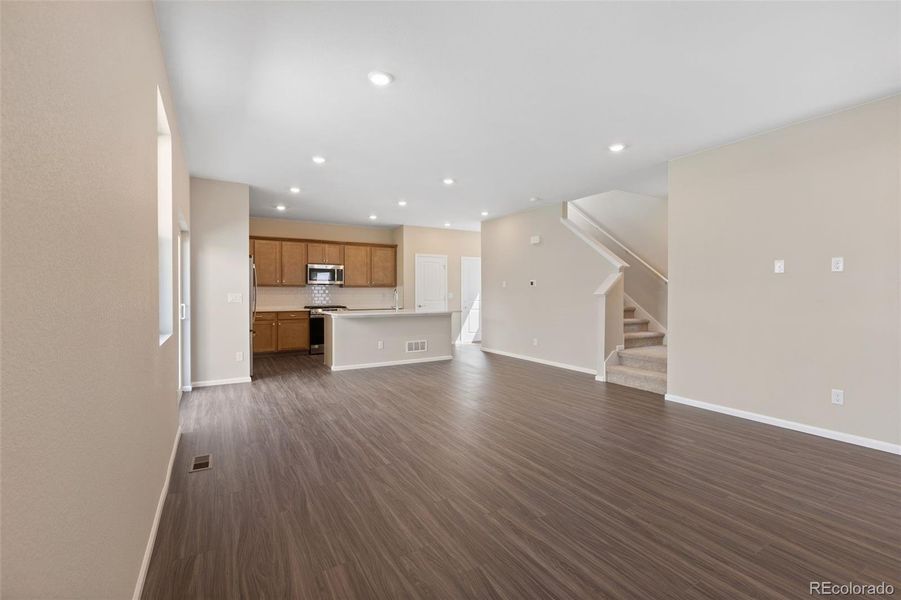 Spacious, unfurnished interior of a new home in Woodrose at Painted Prairie, Aurora (Image 14).