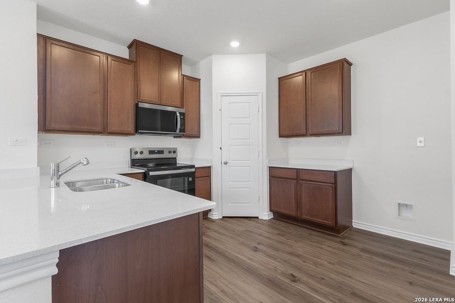 Furnished interior view inside a new home in Medina Crossing, Von Ormy (Image 5). Furnished interior view inside a new home in Medina Crossing, Von Ormy (Image 5).