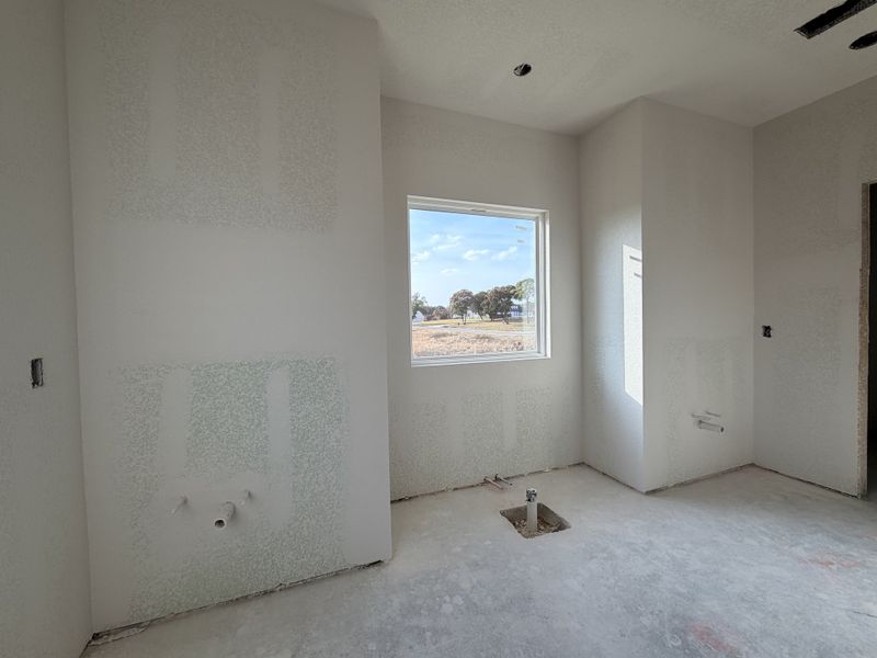 In-progress construction of a new home in Saddle Crest Estates, Weatherford, TX (Image 23).