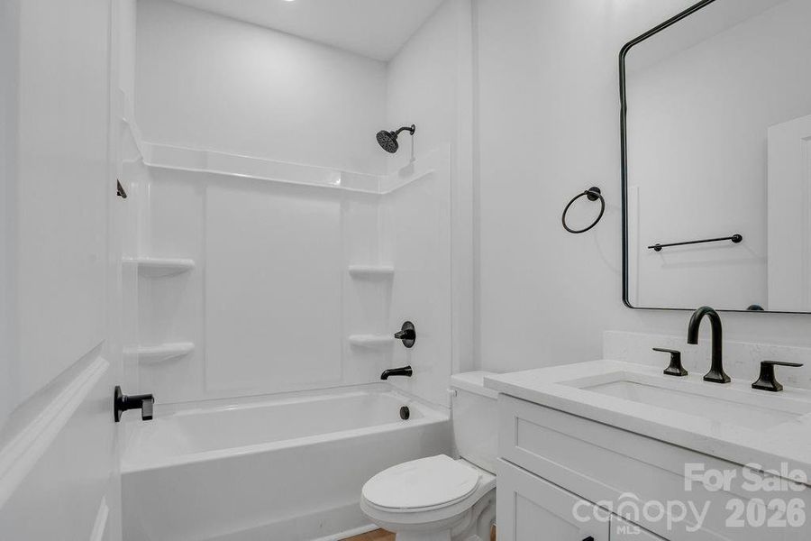 Furnished interior view inside a new home in , Statesville (Image 6).