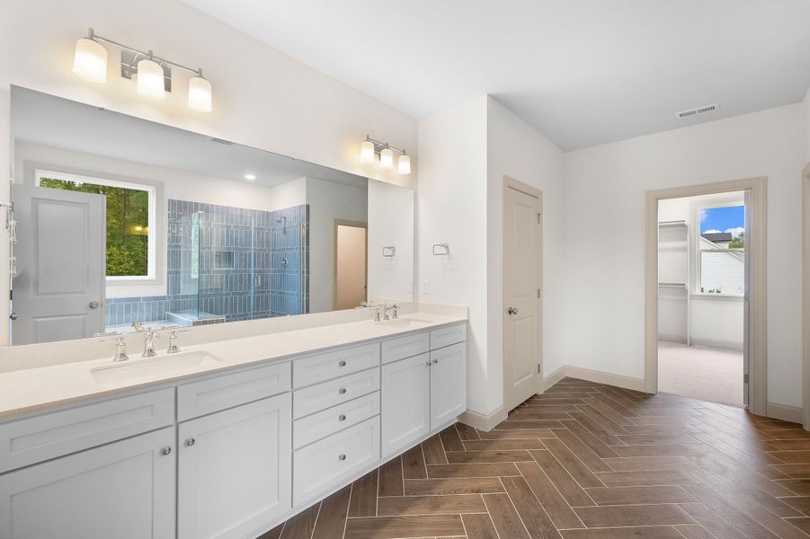 Representative furnished interior of a home built from the The Hampton by RobuckHomes in Baylee Ridge, Selma (Image 125).